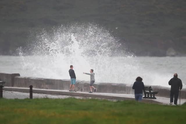 It has been wet across Britain and Ireland over the last week, such as at the Front Strand in Youghal, Co. Cork above on Wednesday. But in Northern Ireland it was not that unusual because autumnal weather typically begins in late August. Photo: Niall Carson/PA Wire