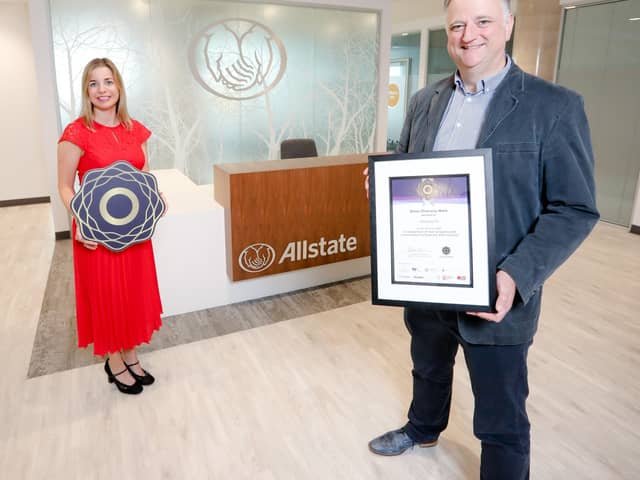 John Healy OBE, Vice President and Managing Director,  Allstate NI pictured receiving the first Silver Diversity Mark Award with Christine White, Head of Business, Diversity Mark NI