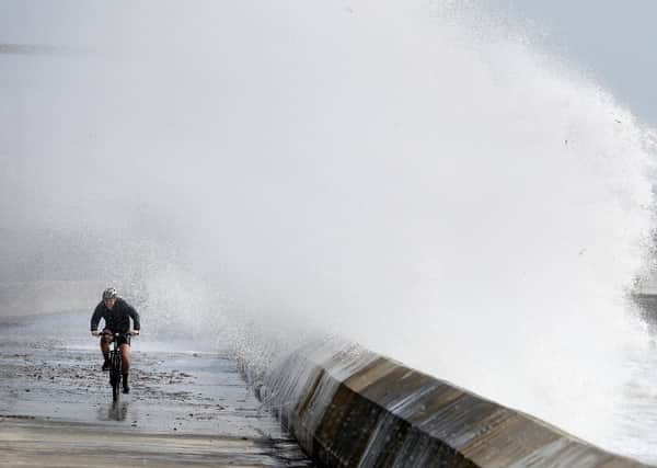 A cyclist on the shoreline in Saltcoats on the west coast of North Ayrshire as Storm Ellen brought gusts of up to 70mph last week.