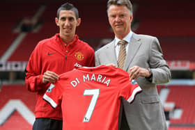 Manchester United manager Louis van Gaal with Angel di Maria during a photo call at Old Trafford, Manchester in 2014.