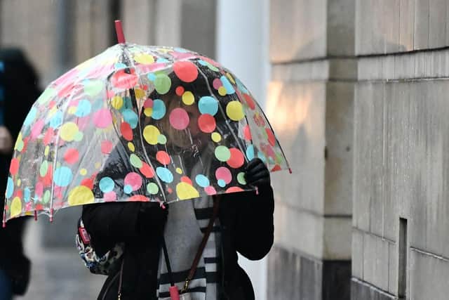 Pacemaker Press 18/1/2019
Taking shelter from the rain in Belfast