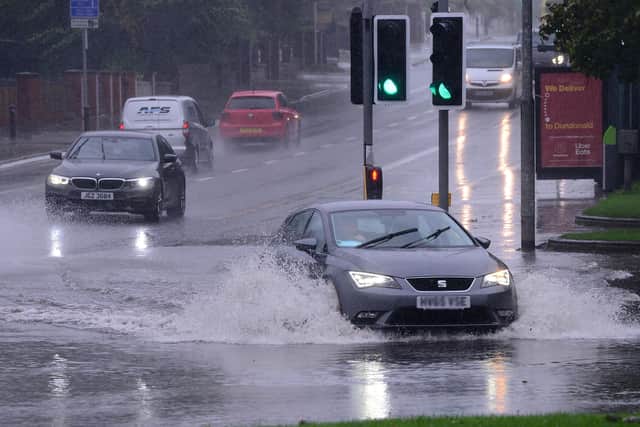 Cars struggle to cope with heavy rain brought by Storm Francis in Belfast: Arthur Allison/ Pacemaker Press