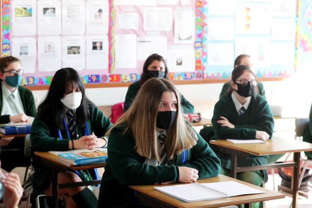 Pupils from Bloomfield Collegiate School Belfast years 12 and 14 wearing masks during lessons.

Photo by Kelvin Boyes / Press Eye.