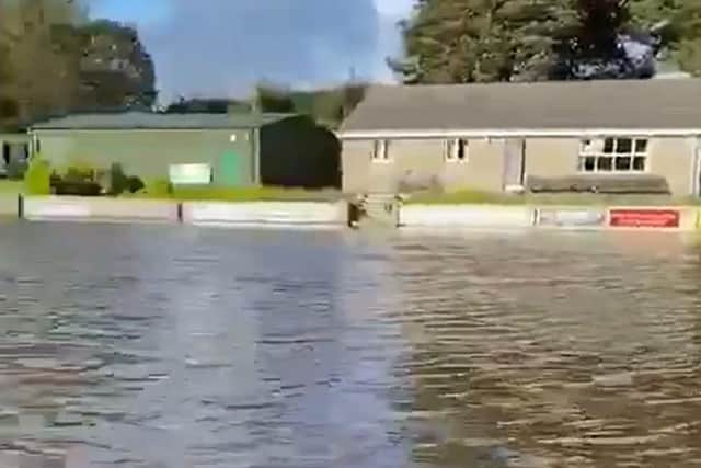 Dundrum Cricket Club showing flooding at their club in Dundrum, County Down, Northern Ireland, as people have been rescued from their homes in Co Down after a river burst its banks and left the town looking "like a disaster zone". PA Photo.