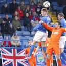 Mark Sykes heads the ball for Glenavon against Linfield in in 2015; the Northern Ireland under-21 player defected to the RoI  (which is allowed because unless you have been capped for the main first team, you can switch country)