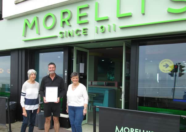 Damian Morelli was recently presented with a 'Certificate of Appreciation' by Claire McCurdy (left) and Dorothy Friar (right)