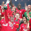 Liverpool captain Jamie Carragher (centre left) lifts the trophy with team-mates after winning the UEFA Super Cup against Monaco at the Louis II Stadium in Monaco in 2005.
