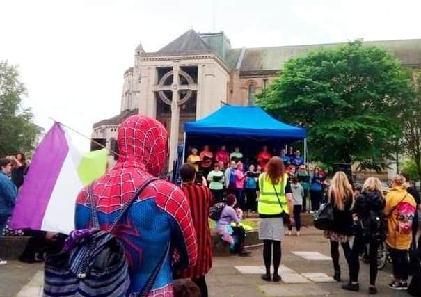 A costumed demonstrator at the first-ever Belfast 'Trans Pride' event, summer, 2019, in the shadow of St Anne's Cathedral. The News Letter was the only media which covered the gathering.