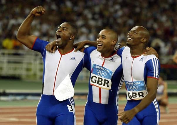 Pictured are (from left) Great Britain's Mark Lewis Francis, Jason Gardener and Marlon Devonish after the British team won the Gold Medal at the Men's 4 x 100m Relay final in the Olympic Stadium in Athens, Greece, in 2004.