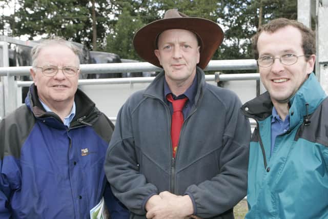 Ivan and Philip Kerr with Tom Madden  pictured at the NBA weaning Management and Cattle Handling demonstration  and Farm walk hosted by Larne farmer James Nelson on Tuesday afternoon.Picture Kevin McAuley Photography Multimedia