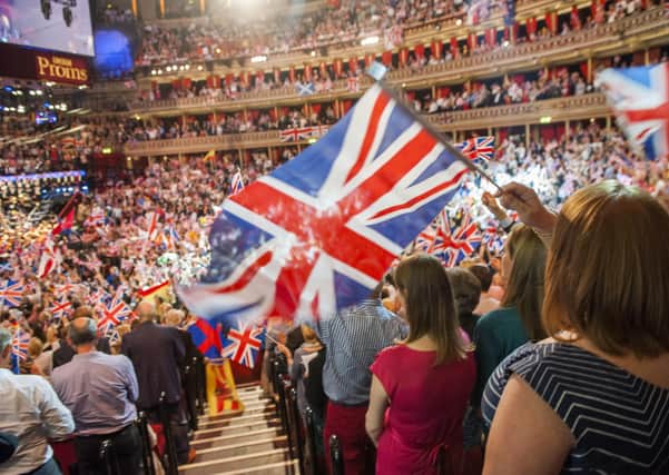 Members of the audience during the Last Night of the Proms at the Royal Albert Hall, London in 2014. This year the traditional favourites such as Land Of Hope And Glory will be performed without lyrics at the Proms. Photo: Guy Bell/PA Wire