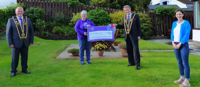 The cheque presentation to the Northern Ireland Children's Hospice was attended by the Royal Black and Mrs Irwin herself