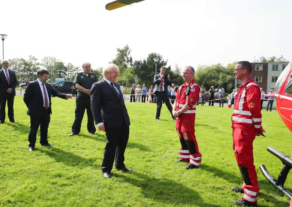 Prime Minister Boris Johnson visits Northern Ireland Ambulance Service in south Belfast in August. His ‘seamless’ NI-GB trade pledged has been shown to be nonsense, writes Carl McClean. Photo by Kelvin Boyes / Press Eye