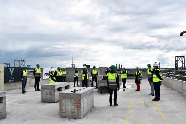 GRAHAM representatives from the privately-owned contractor gathered with senior management from developers, Valeo Group, to celebrate the installation of the highest fixing of the project