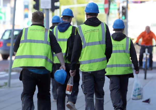 PACEMAKER,BELFAST, 11/5/2020: Construction workers on their way to the new University of Ulster site in Belfast.
PICTURE BY STEPHEN DAVISON
