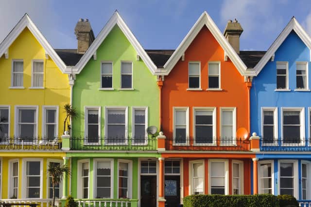 Four colourful Victorian three storey houses in Northern Ireland