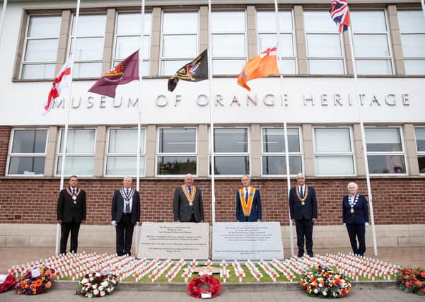 The 339 members of the Orange Institution murdered during the Troubles were remembered at a ceremony in Belfast today to mark the third annual Orange Victims’ Day.  Pictured in the memorial garden at Schomberg House are, from left, Governor Graeme Stenhouse, Apprentice Boys of Derry; Grand Master John Clarke, Grand Royal Arch Purple Chapter; Grand Master of the Grand Orange Lodge of Ireland Most Wor. Bro. Edward Stevenson; Junior Grand Master Bro. Roy Nixon, Junior Grand Orange Lodge; Sovereign Grand Master of the Royal Black Institution Rev William Anderson and Grand Mistress of the Association of Loyal Orangewomen of Ireland Sister Joan Beggs. Photo: Graham Baalham-Curry