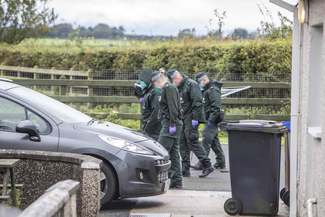 02/09/20 MCAULEY MULTIMEDIA..PSNI at the scene of a paramilitary style attack on the Ballyclogh Road outside Bushmills on Tuesday night