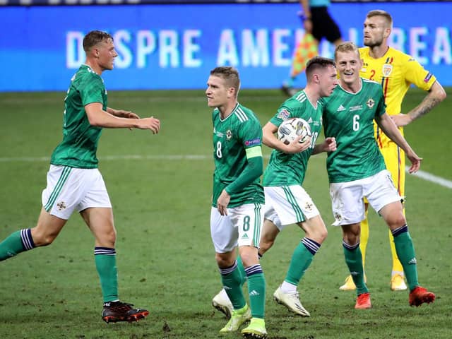 Northern Ireland's Gavin Whyte celebrates scoring against Romania