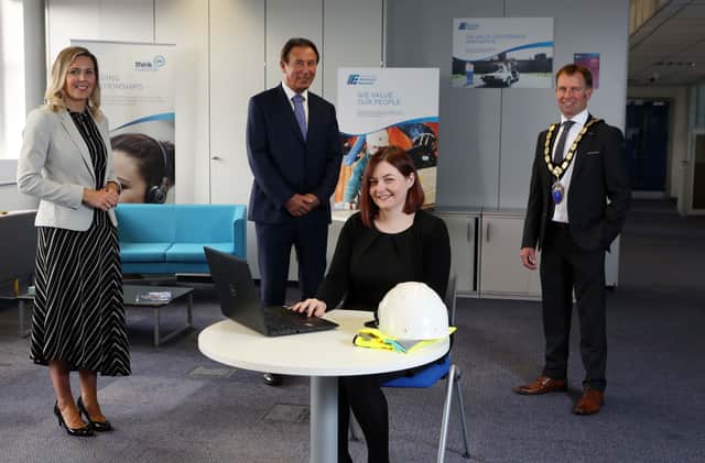 Louise Turley (NI Chamber), Gordon Parkes (NIE Networks) and Ian Henry (NI Chamber) are pictured with Holly Brown, a Quantity & Building Surveying Apprentice at NIE Networks