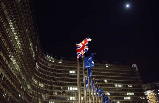 The British and EU flags flap in the wind outside the European Union headquarters. "It is Brussels, not London, that is the colonialist bully in this matter.  Boris Johnson is not Dublin’s biggest enemy," writes Matt O'Dowd