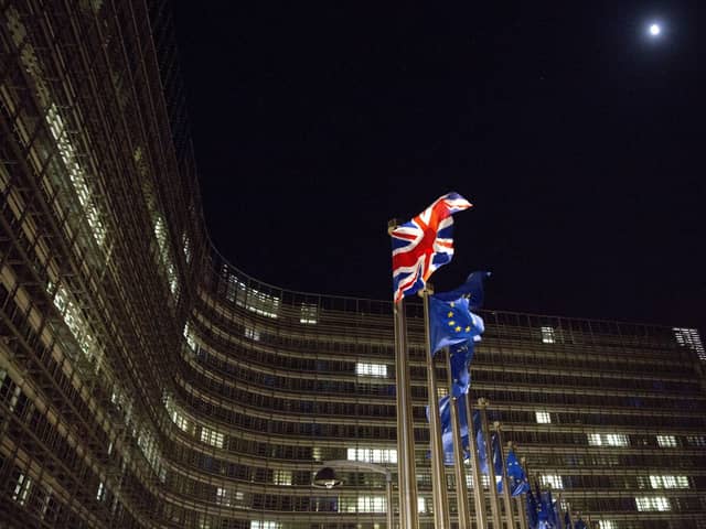 The British and EU flags flap in the wind outside the European Union headquarters. "It is Brussels, not London, that is the colonialist bully in this matter.  Boris Johnson is not Dublin’s biggest enemy," writes Matt O'Dowd