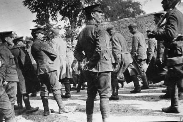 British Troops with German Prisoners from Battle of Festubert, May 1915. Imperial War Museum Photo