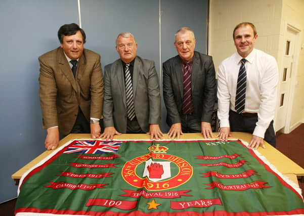 David Campbell, left, chair of the Loyalist Communities Council (LCC) pictured in 2016 with a new flag for the centenary of the Battle of the Somme alongside the loyalists Jim Wilson, Jackie McDonald and Winston Irvine.
 Picture by Pacemaker Press