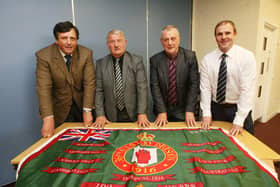 David Campbell, left, chair of the Loyalist Communities Council (LCC) pictured in 2016 with a new flag for the centenary of the Battle of the Somme alongside the loyalists Jim Wilson, Jackie McDonald and Winston Irvine.
 Picture by Pacemaker Press