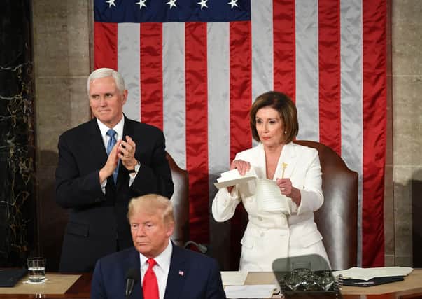 Nancy Pelosi, seen right in a political spat with President Trump and Vice President Pence during the State of the Union Address earlier this year, is the powerful speaker of the House of Representatives