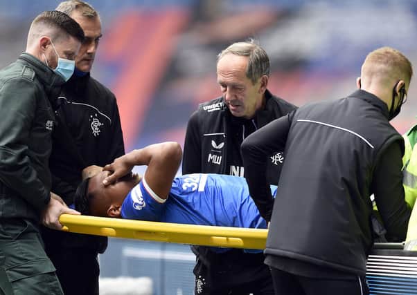 Rangers' Alfredo Morelos is taken off the pitch on a stretcher after picking up an injury during the Scottish Premiership match at Ibrox on Saturday. Pic by PA.