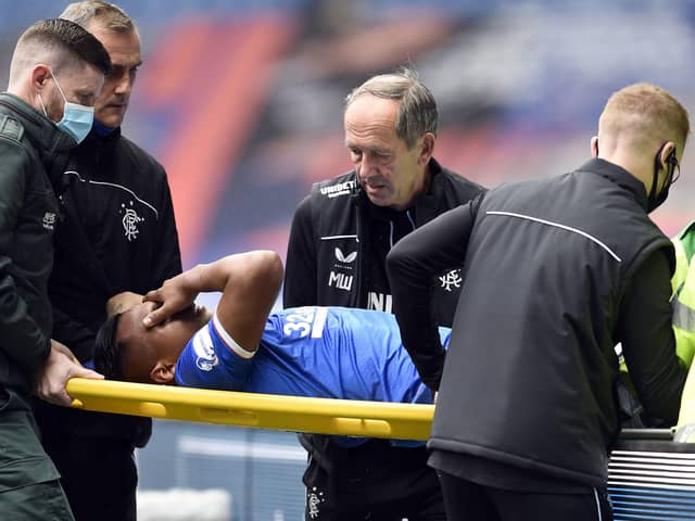 Rangers' Alfredo Morelos is taken off the pitch on a stretcher after picking up an injury during the Scottish Premiership match at Ibrox on Saturday. Pic by PA.