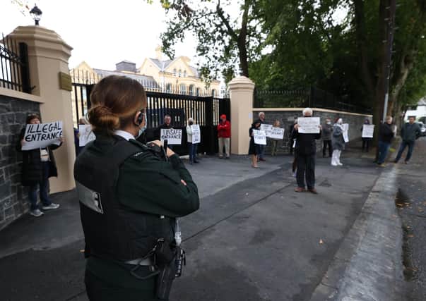 Residents protesting outside the Chinese Consulate in south Belfast, amid a dispute over the construction of a boundary wall and entrance gate which have been built without planning permission. Photo: Liam McBurney/PA Wire