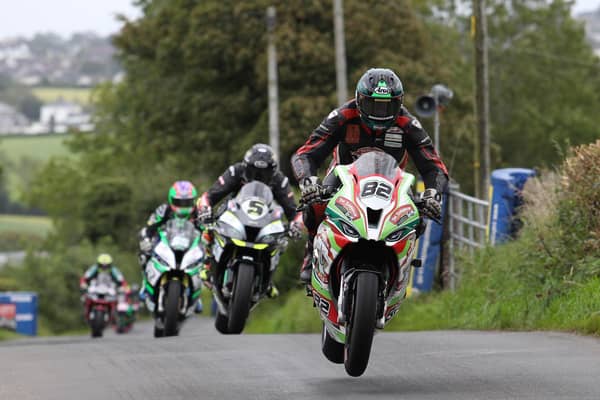 Derek Sheils (Roadhouse Macau BMW) leads Thomas Maxwell (Kawasaki) and Michael Sweeney (MJR BMW) in the Open Superbike race at the Cookstown 100 on Saturday. Picture: Pacemaker Press.