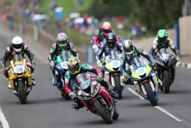 Man of the Meeting Adam McLean (McAdoo Kawasaki) leads the Supersport pack at the KDM Hire Cookstown 100.