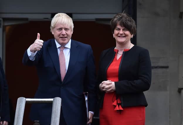Boris Johnson with Arlene Foster. If the EU can break up the UK then it is as a result of the deal he agreed. "It is a pity that Mrs Foster seemed to reconcile herself to what she thought was inevitable, unlike her past strident approach," writes David Barbour who, like Mrs Foster, is a former member of the Ulster Unionist Party