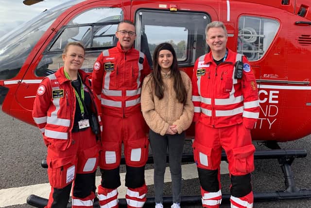 Ellie thanking the Air Ambulance crew who saved her life