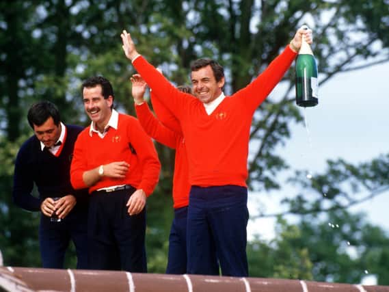 Tony Jacklin celebrates on the roof with Severiano Ballesteros and Sam Torrance after winning the Ryder Cup played at The Belfry Golf Club