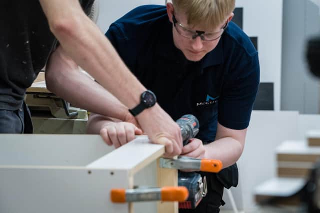 The five apprentices undertake on-the-job training