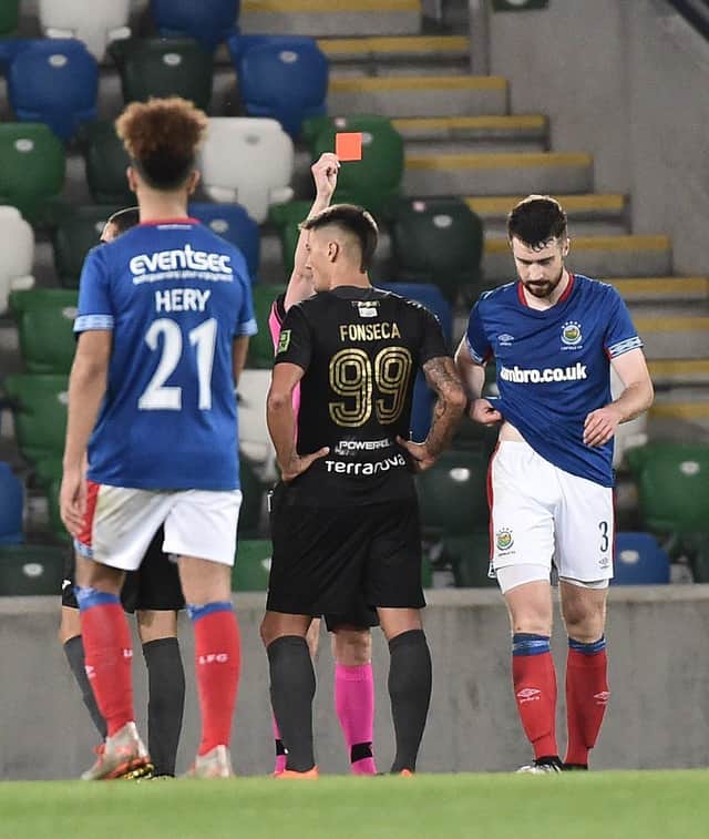 Ross Larkin (right) was sent off in Linfield's 1-0 loss to Floriana. Pic by Pacemaker.