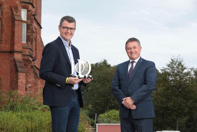 Among the winners was Brendan Mooney of the Kainos Group, pictured receiving the prestigious Chairman’s Award for Excellence in Director and Board Practice from IoD NI Chairman Gordon Milligan