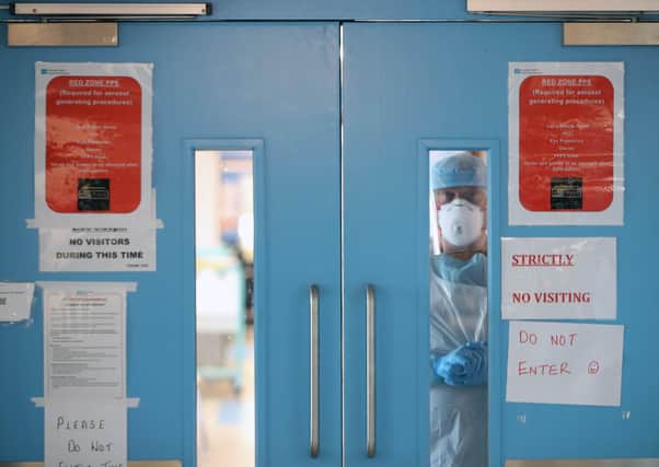 Infection Control nurse Colin Clarke looks out from a Covid-19 recovery ward at Craigavon Area Hospital in Co Armagh, Northern Ireland. (Photo: PA Wire)