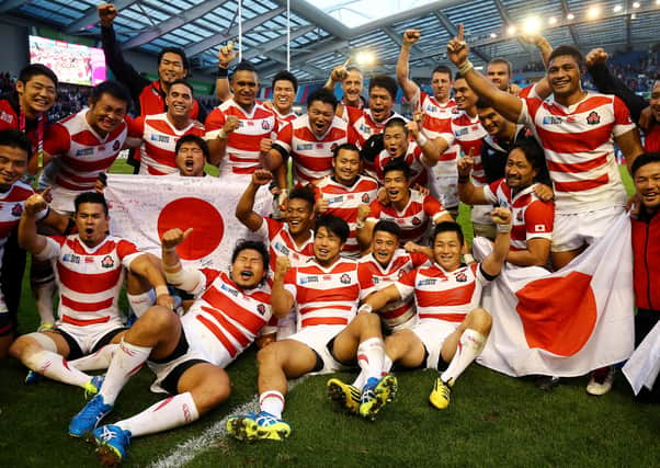 File photo dated 19-09-2015 of Japan celebrating victory over South Africa during the Rugby World Cup match at the Brighton Community Stadium.