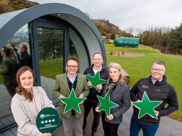 Further.space at Glenarm Castle glamping pods is the first pod site to be awarded Guest Accommodation Certification and a four star grading by Tourism NI. Pictured at the grading announcement are Samantha Corr, Tourism NI, Randal and Aurora McDonnell, Lord and Lady Dunluce with Peter Farquharson and David Maxwell from Further.Space
