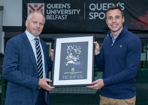 British Lion Trevor Ringland presents Tommy Bowe with Queen's Greatest Ever XV print. Pic by Bob Given.