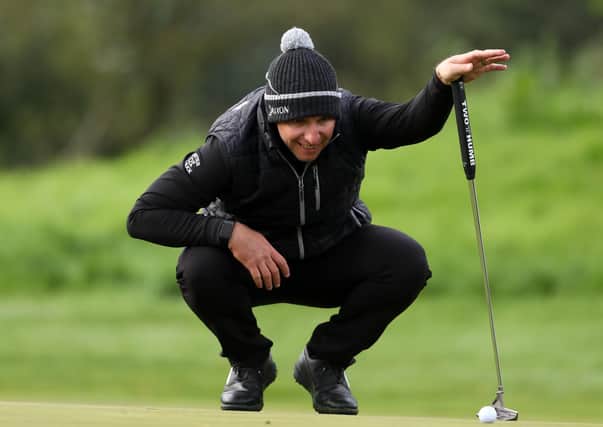 South Africa’s Dean Burmester lines up a putt on the sixth during day one of the Irish Open at Galgorm Castle. Pic PA.