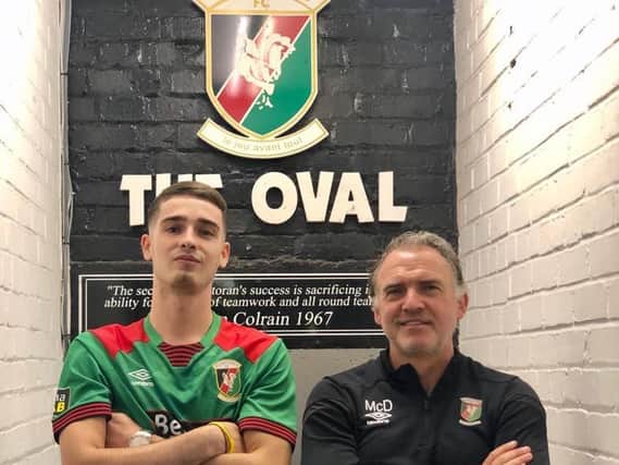 Jay Donnelly pictured with Glentoran Head Coach Mick McDermott