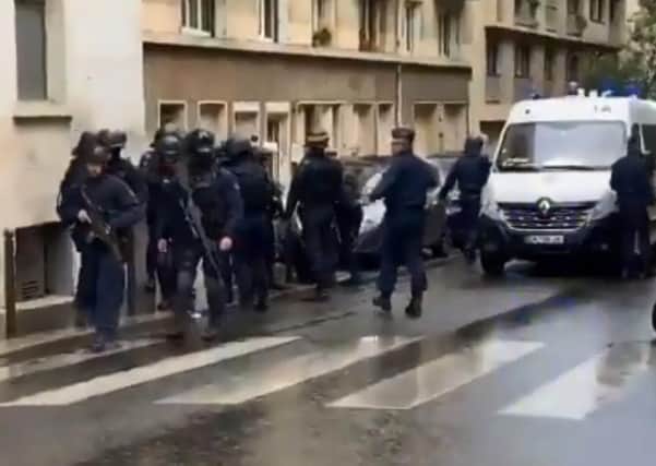 The scene near the old offices of Charlie Hebdo.