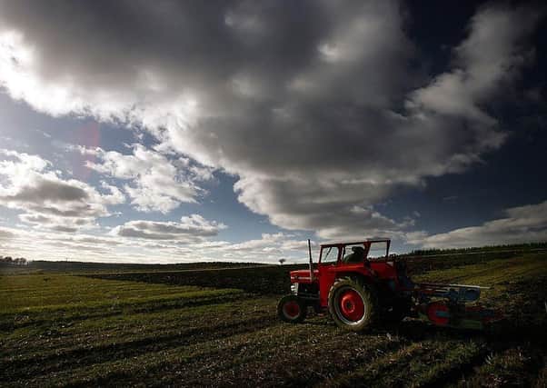 AUCHTERARDER, SCOTLAND - MARCH 09:  A tractor takes part in a ploughing competition close to the Perthshire village of Auchterarder March 9, 2005 which is preparing for the 2005 G8 Summit at Gleneagles Hotel Auchterarder, Scotland. According to police, the tightest security in Scottish history will be implemented for the meeting which will be held from July 6-8, 2005 in the quiet countryside town.  (Photo by Christopher Furlong/Getty Images)