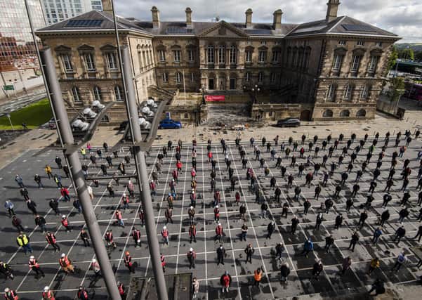 At Belfast’s Custom House Square, over 500 members of the live events community gathered in a socially distanced, Covid-compliant display